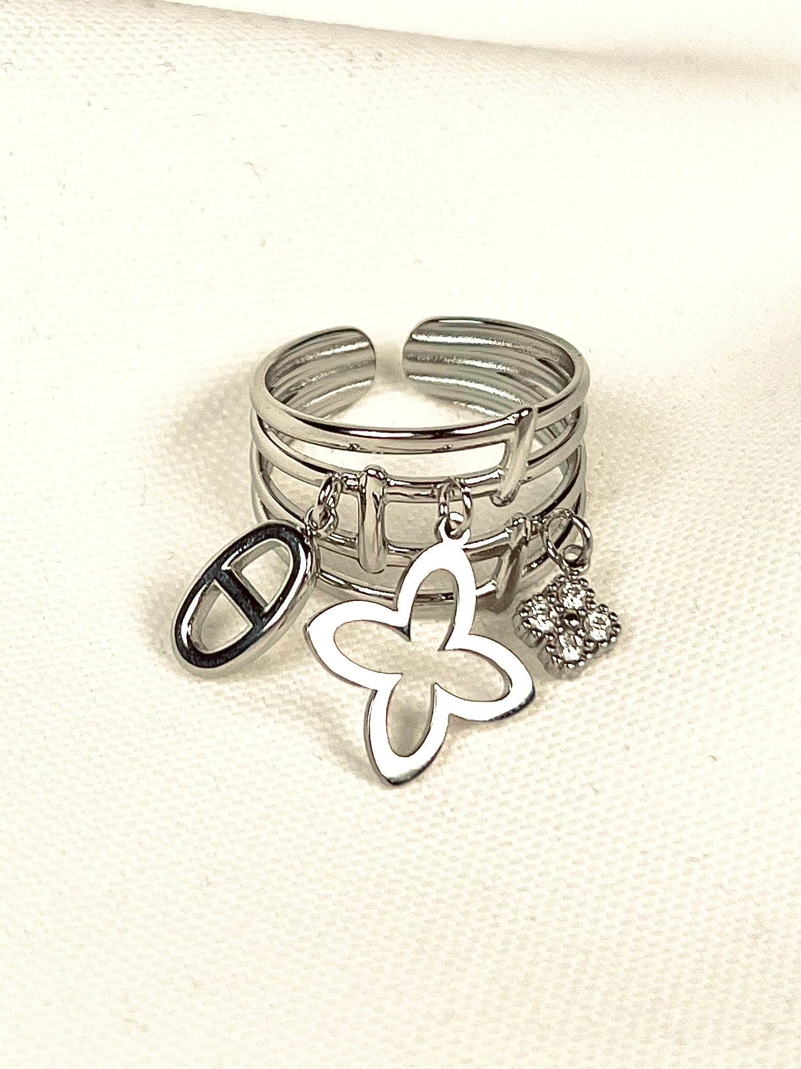 Bague pampille argent multi brins en acier inoxydable.
